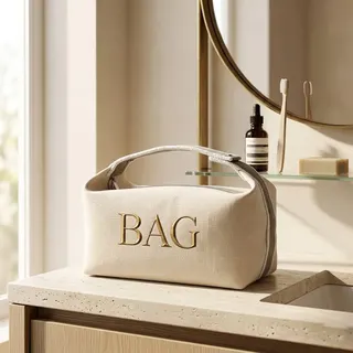 Custom canvas makeup bag with gold logo lettering